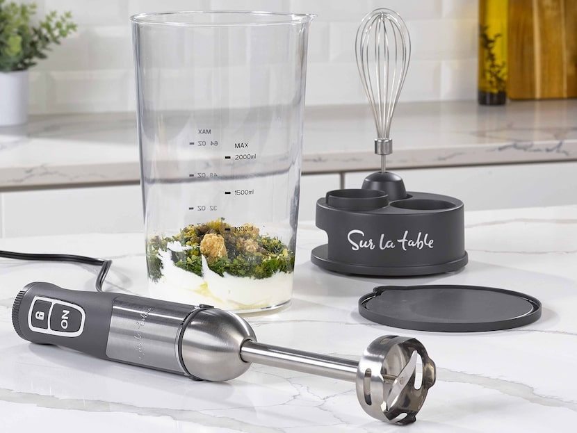 Immerse the hand blender on a clean counter and whisk and stop